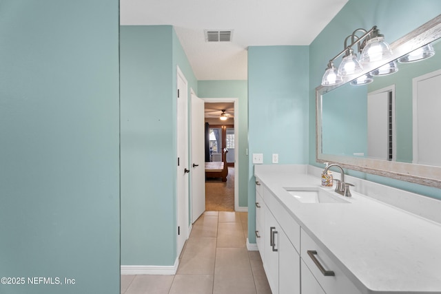 bathroom with vanity, tile patterned flooring, and ceiling fan