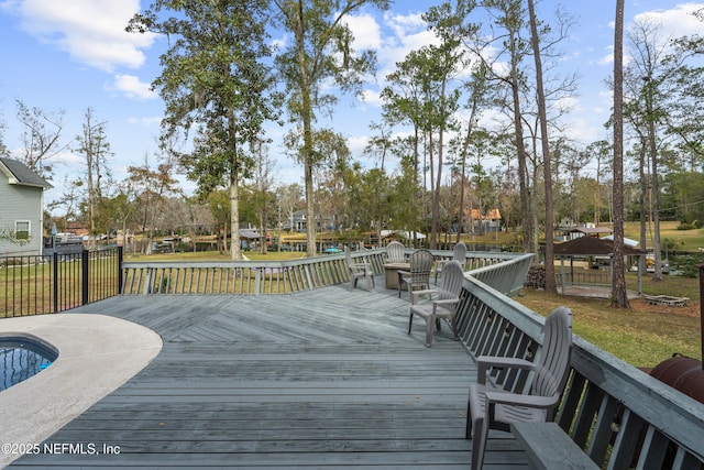 wooden deck with a yard