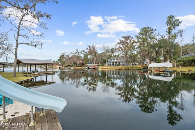 view of dock with a water view