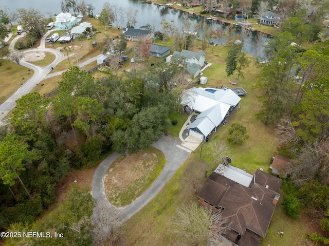 birds eye view of property featuring a water view