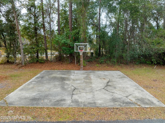 view of patio / terrace featuring basketball hoop