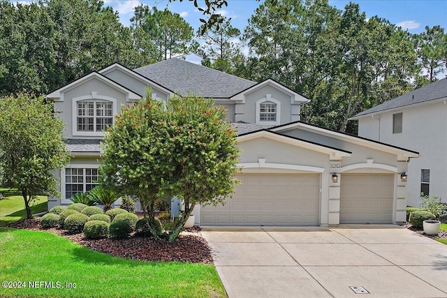 view of front property with a garage