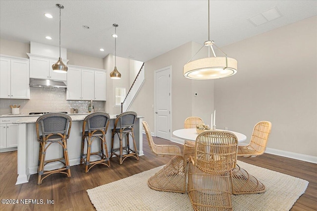 dining room featuring dark hardwood / wood-style floors