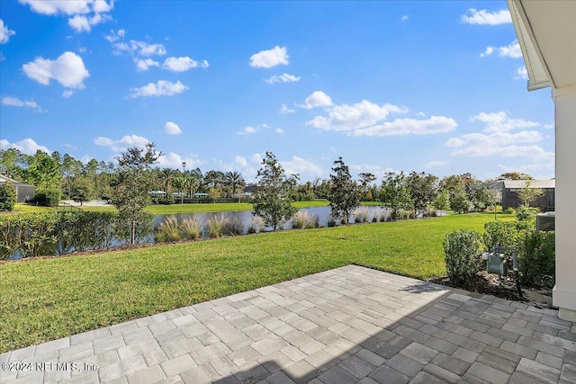 view of patio / terrace featuring a water view