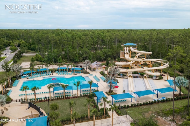 view of swimming pool featuring a water slide