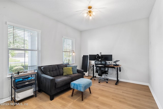 home office featuring light wood-type flooring and plenty of natural light