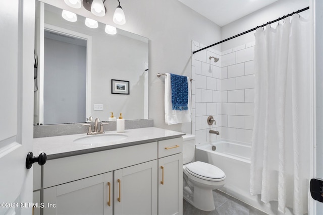 full bathroom with tile patterned flooring, vanity, toilet, and shower / bath combo with shower curtain