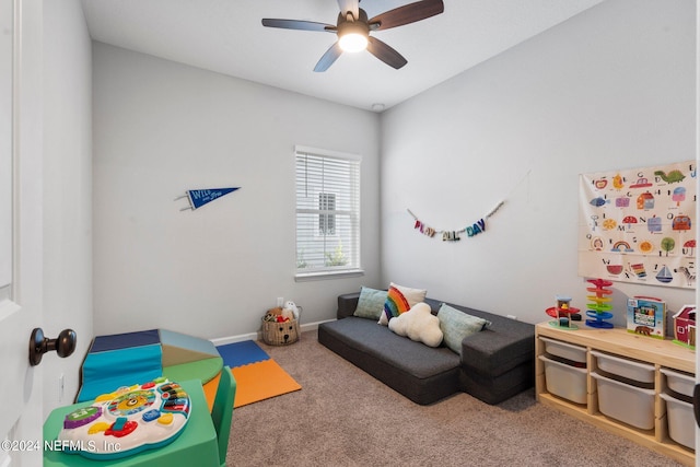 playroom with carpet flooring and ceiling fan