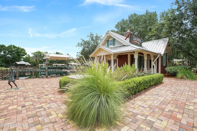 view of side of property with a water view