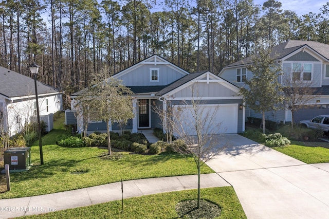 view of front of house with a front lawn and a garage