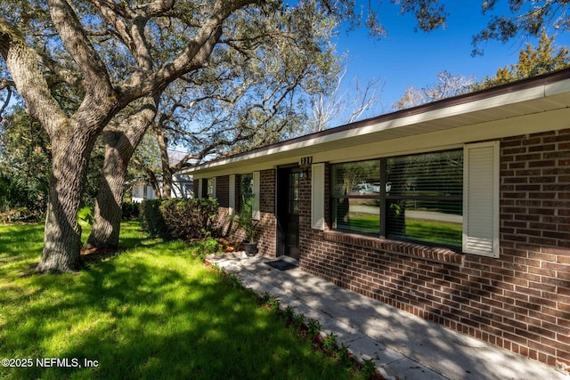 exterior space featuring a yard