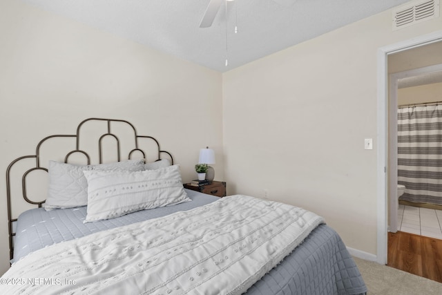 bedroom featuring ceiling fan and carpet flooring