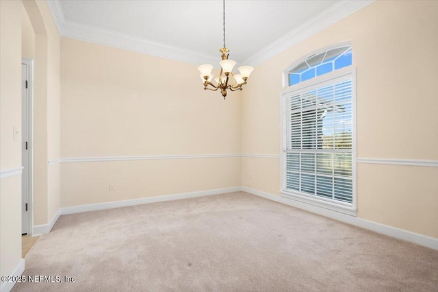 spare room featuring light carpet, a notable chandelier, and ornamental molding