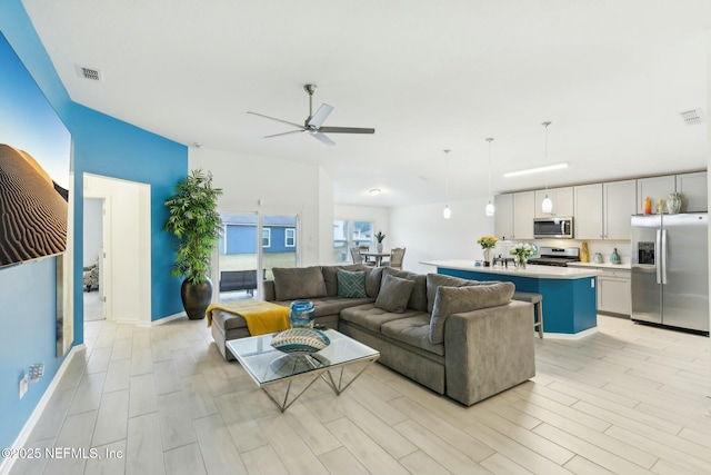 living room featuring ceiling fan