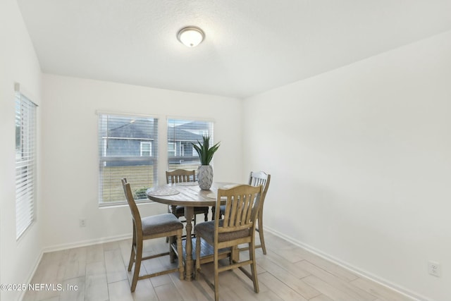 dining room featuring light hardwood / wood-style floors