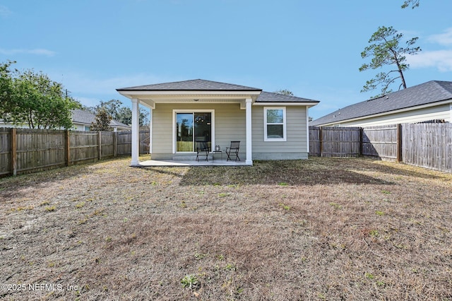 back of property featuring a patio