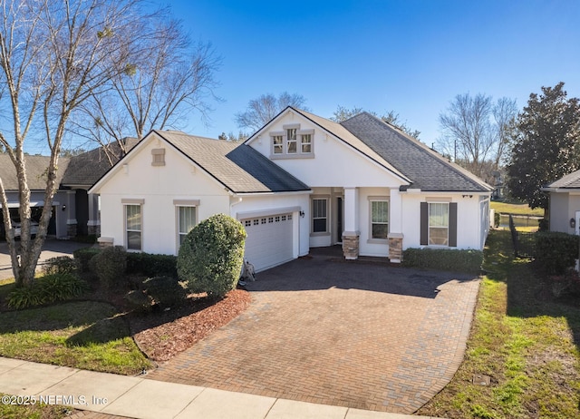 view of front of home with a garage