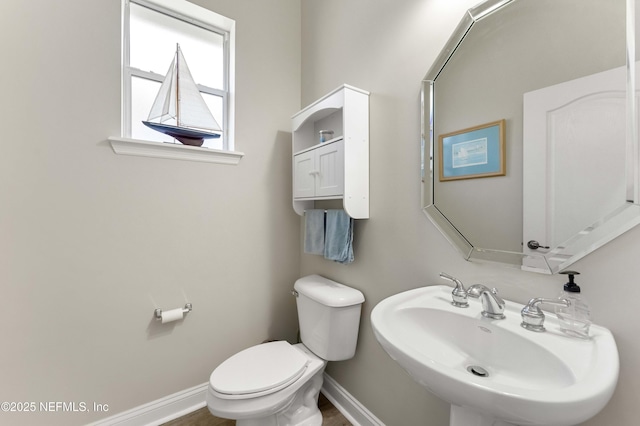 bathroom with sink and toilet