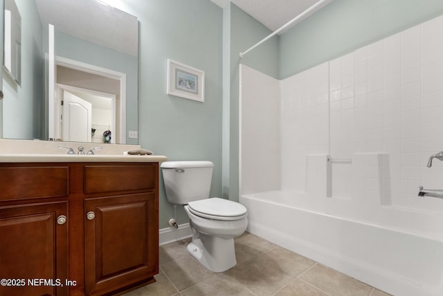 full bathroom with tile patterned floors, vanity, toilet, and shower / bath combination