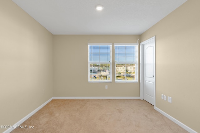 empty room with light carpet