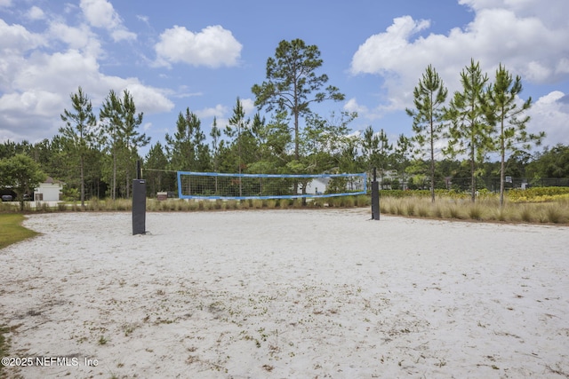 view of home's community featuring volleyball court