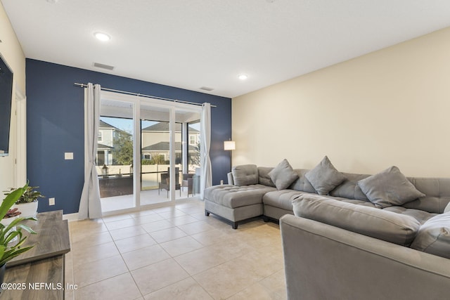 living room with light tile patterned flooring