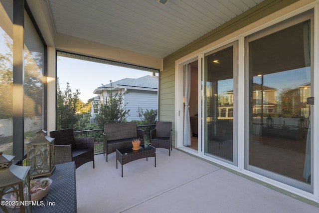 view of patio / terrace featuring a balcony and an outdoor living space