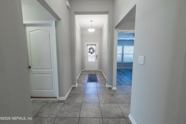 entryway featuring tile patterned flooring