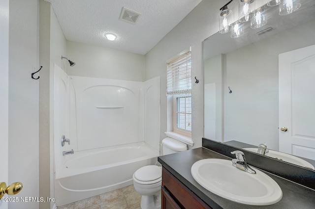 full bathroom featuring vanity, shower / bathing tub combination, a textured ceiling, and toilet