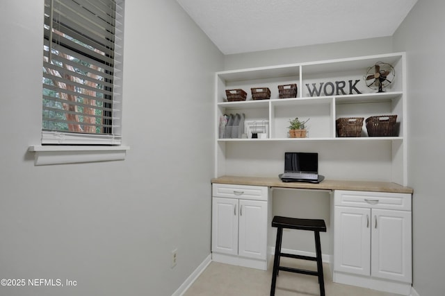 home office featuring built in desk