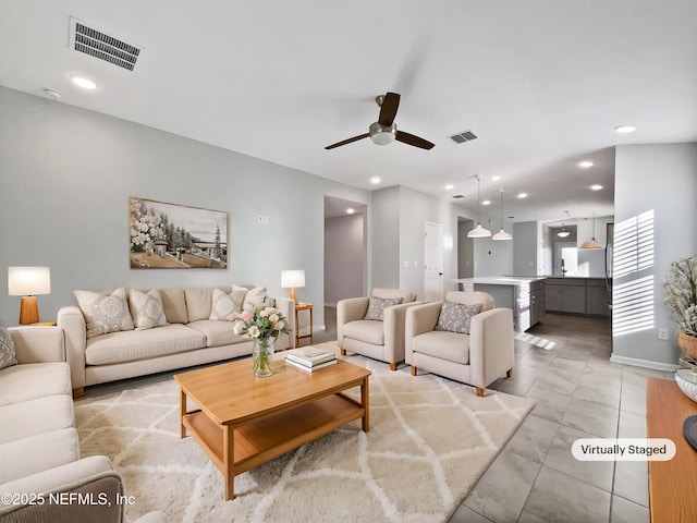 living room featuring ceiling fan