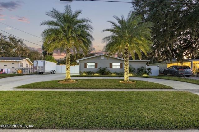 view of front of home with a yard