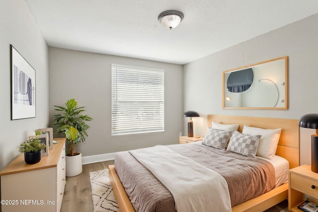 bedroom featuring light hardwood / wood-style flooring