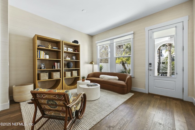 living area with dark wood-type flooring