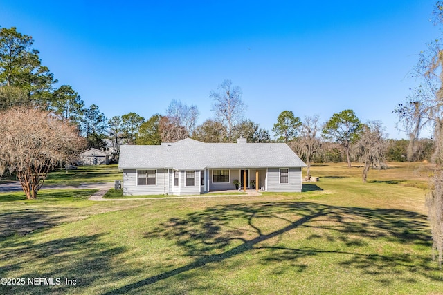 view of front of house with a front lawn