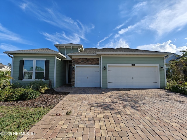 view of front of home featuring a garage