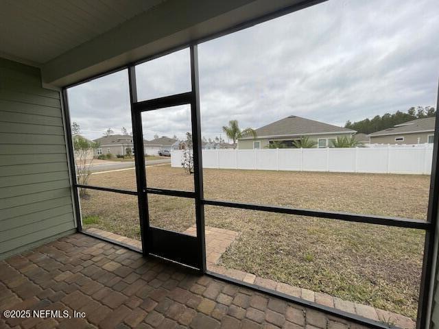 view of unfurnished sunroom