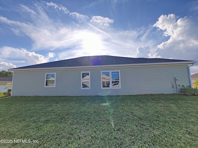 view of property exterior with a lawn