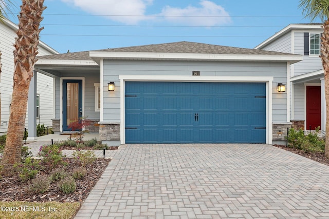 view of front of house with a garage