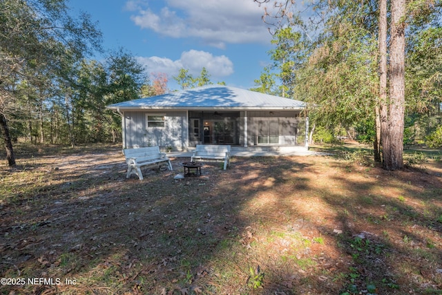 view of yard featuring a sunroom