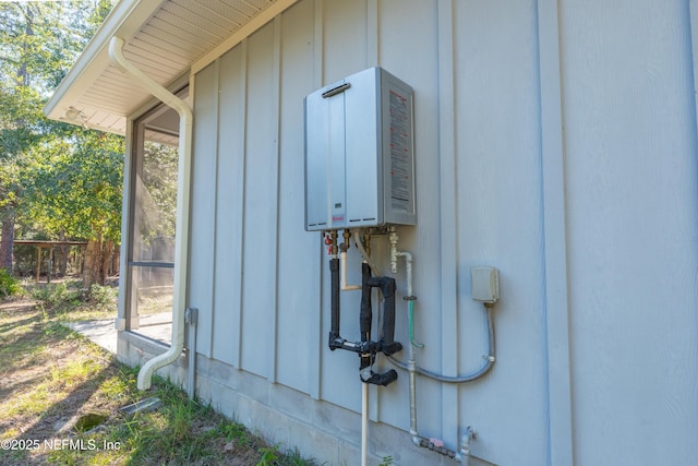 view of side of property featuring tankless water heater