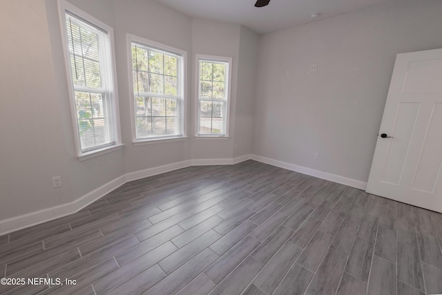 spare room with ceiling fan