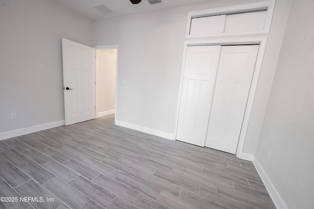 unfurnished bedroom featuring a closet