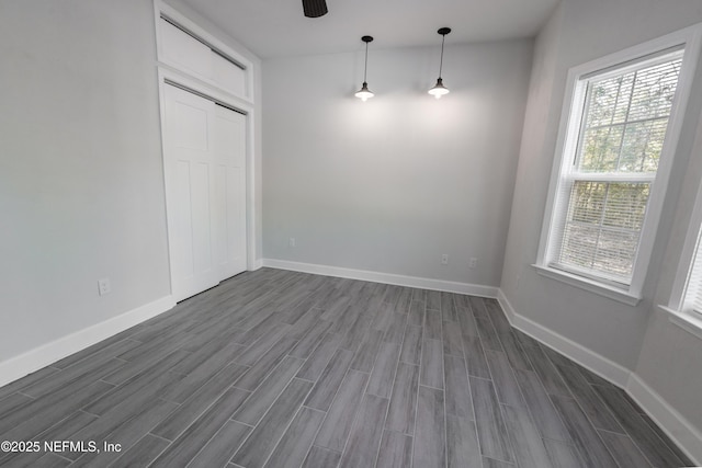 empty room featuring ceiling fan