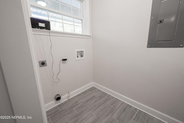 washroom featuring electric dryer hookup, hookup for a washing machine, and electric panel