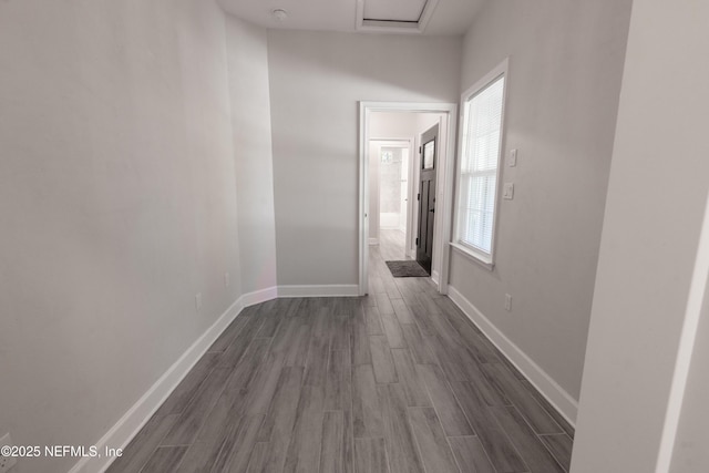 hall with dark wood-type flooring