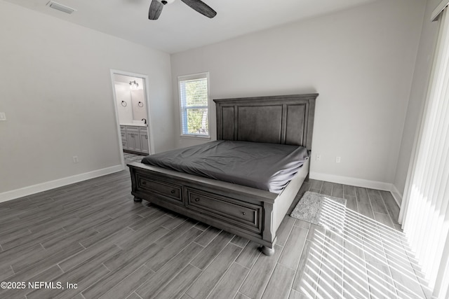 bedroom with ensuite bathroom and ceiling fan