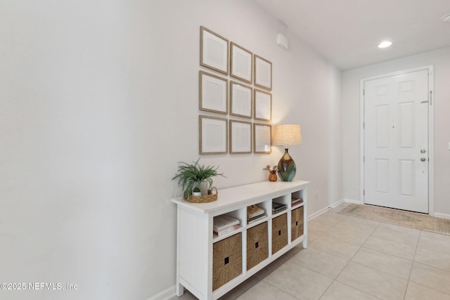 foyer featuring light tile patterned floors