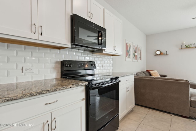 kitchen with decorative backsplash, black appliances, stone counters, white cabinetry, and light tile patterned flooring