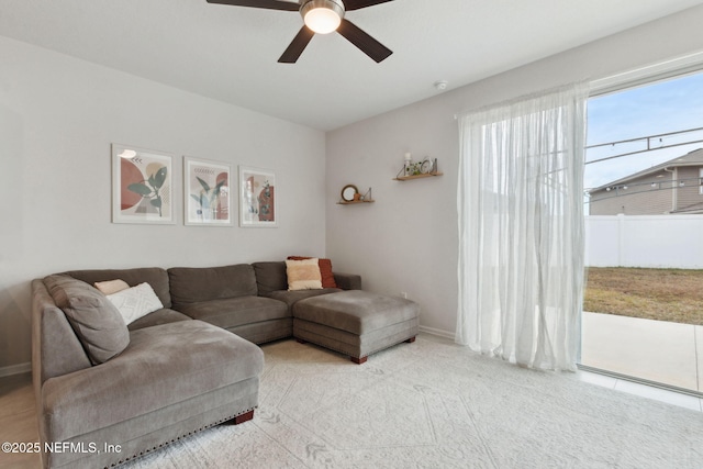 living room with ceiling fan